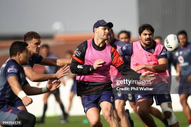 Simon Mannering of the Warriors passes during a New Zealand Warriors NRL training session at Mount Smart Stadium on July 10, 2018 in Auckland, New...