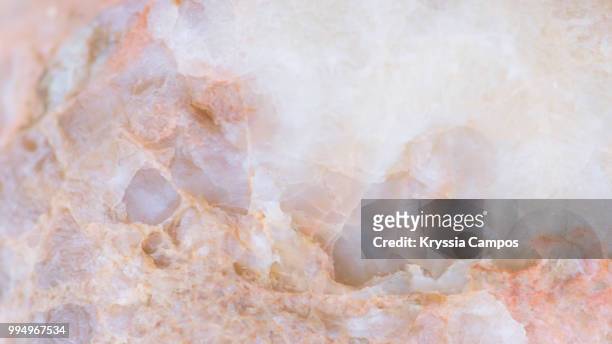 extreme close up of rock, texture - beach stone stock-fotos und bilder