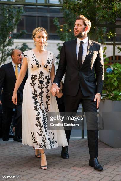 Emily Blunt and John Krasinski are seen in Midtown on July 9, 2018 in New York City.