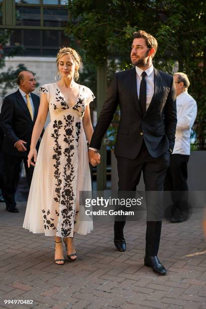 Emily Blunt and John Krasinski are seen in Midtown on July 9, 2018 in New York City.