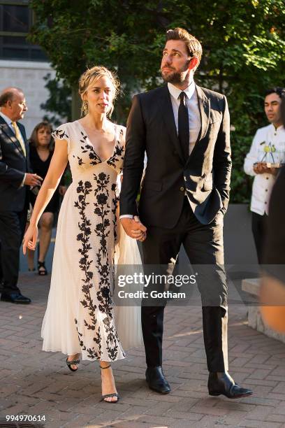 Emily Blunt and John Krasinski are seen in Midtown on July 9, 2018 in New York City.