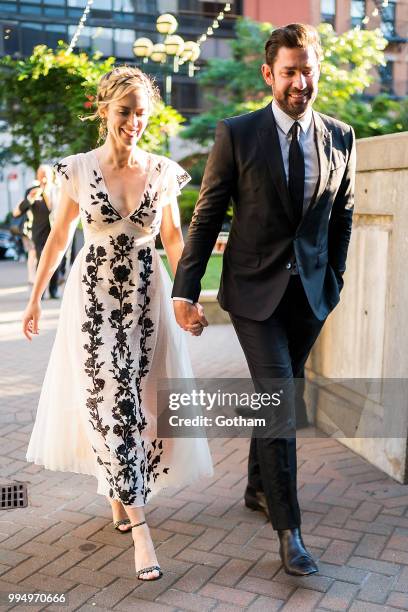 Emily Blunt and John Krasinski are seen in Midtown on July 9, 2018 in New York City.