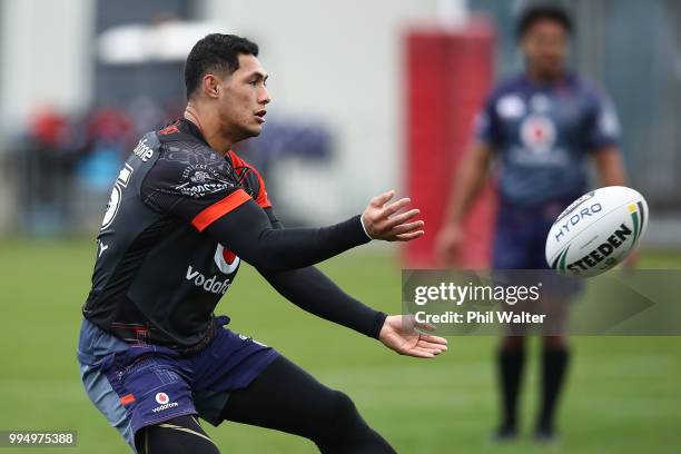 Roger Tuivasa-Sheck of the Warriors passes during a New Zealand Warriors NRL training session at Mount Smart Stadium on July 10, 2018 in Auckland,...