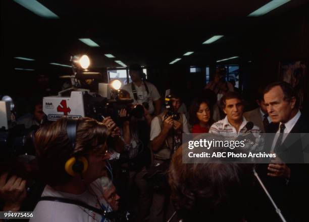 George HW Bush speaks with reporters during the 1980 campaign.