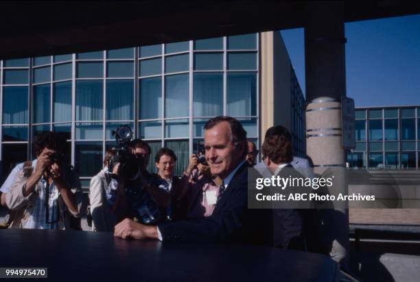 George HW Bush speaks with reporters during the 1980 campaign.