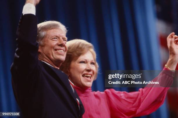 President Jimmy Carter, First Lady Rosalynn Carter waving to crowd.