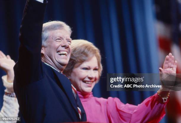 President Jimmy Carter, First Lady Rosalynn Carter waving to crowd.