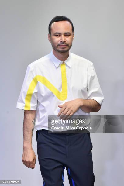 Designer Carlos Campos walks the runway during his show - Runway - July 2018 New York City Men's Fashion Week at Industria Studios on July 9, 2018 in...