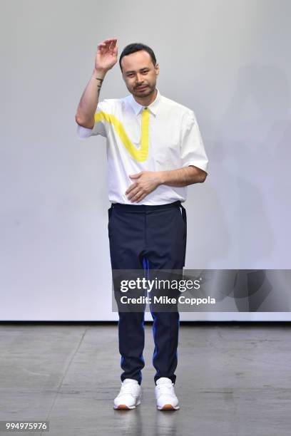 Designer Carlos Campos walks the runway during his show - Runway - July 2018 New York City Men's Fashion Week at Industria Studios on July 9, 2018 in...