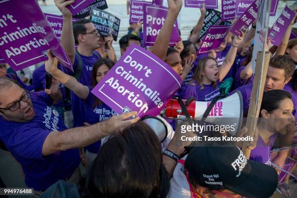 Pro-choice and anti-abortion protesters demonstrate in front of the U.S. Supreme Court on July 9, 2018 in Washington, DC. President Donald Trump is...