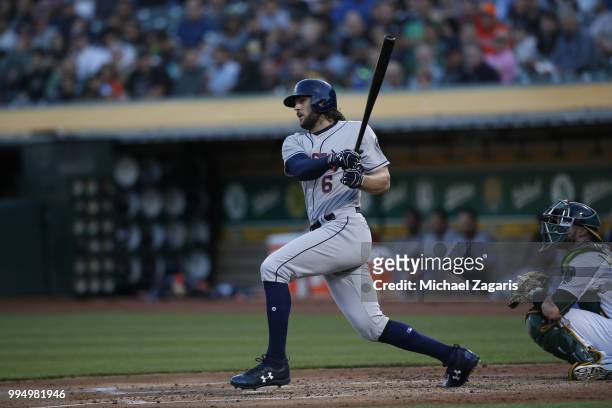 Jake Marisnick of the Houston Astros bats during the game against the Oakland Athletics at the Oakland Alameda Coliseum on June 13, 2018 in Oakland,...