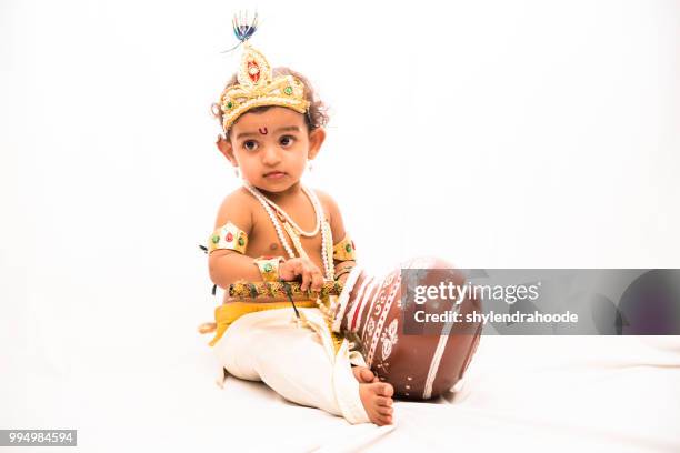 liten flicka i krishna klänning - krishna bildbanksfoton och bilder