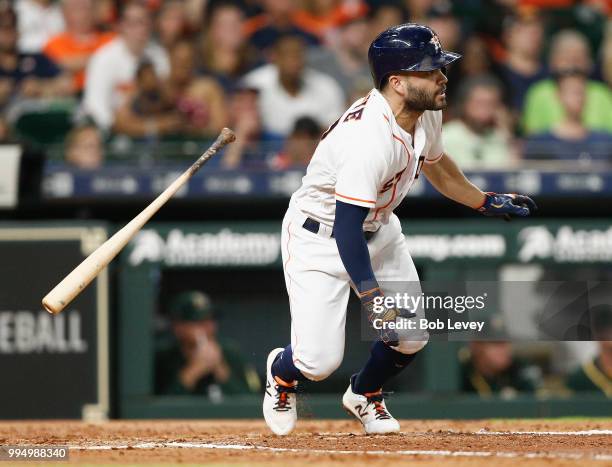 Jose Altuve of the Houston Astros singles in the fourth inning against the Oakland Athletics at Minute Maid Park on July 9, 2018 in Houston, Texas.