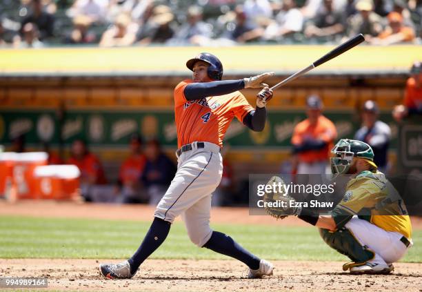 George Springer of the Houston Astros bats against the Oakland Athletics at Oakland Alameda Coliseum on May 9, 2018 in Oakland, California.