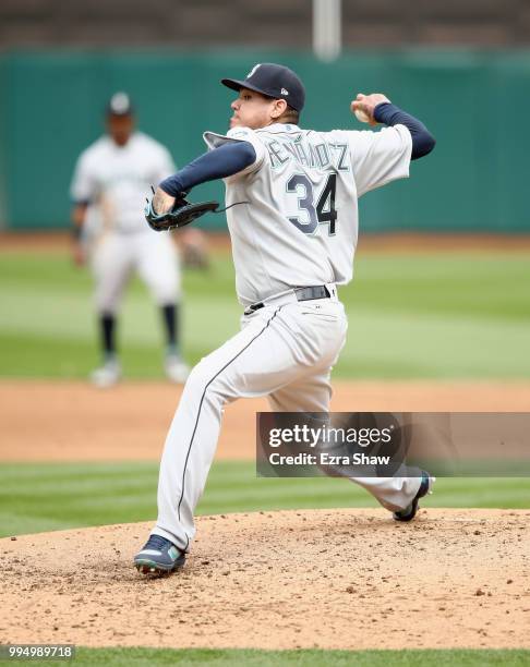 Felix Hernandez of the Seattle Mariners pitches against the Oakland Athletics at Oakland Alameda Coliseum on May 24, 2018 in Oakland, California.