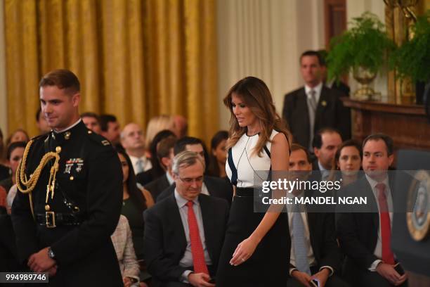 First Lady Melania Trump arrives to witness the US president announcing his Supreme Court nominee in the East Room of the White House on July 9, 2018...