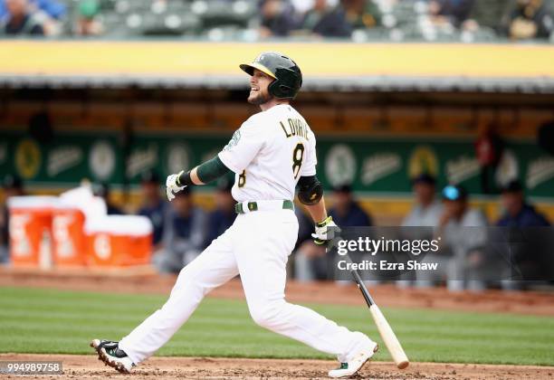 Jed Lowrie of the Oakland Athletics bats against the Seattle Mariners at Oakland Alameda Coliseum on May 24, 2018 in Oakland, California.