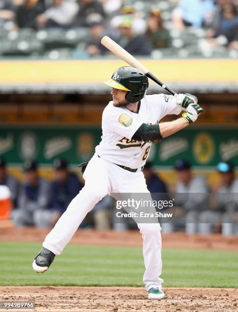 Jed Lowrie of the Oakland Athletics bats against the Seattle Mariners at Oakland Alameda Coliseum on May 24, 2018 in Oakland, California.