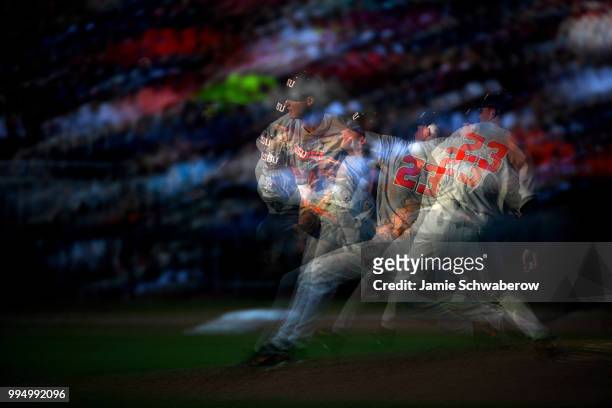 Kevin Abel of the Oregon State Beavers pitches against the Arkansas Razorbacks during the Division I Men's Baseball Championship held at TD...