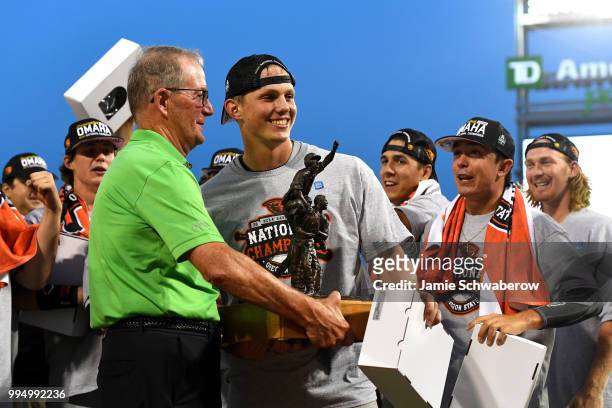 Adley Rutschman of the Oregon State Beavers is awarded the Most Outstanding Player award against the Arkansas Razorbacks during the Division I Men's...