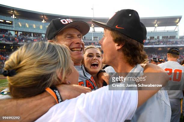 Head Coach Pat Casey of the Oregon State Beavers celebrates with his family after defeating the Arkansas Razorbacks during the Division I Men's...