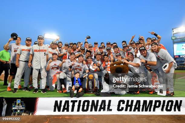 The Oregon State Beavers celebrate after defeating the Arkansas Razorbacks during the Division I Men's Baseball Championship held at TD Ameritrade...