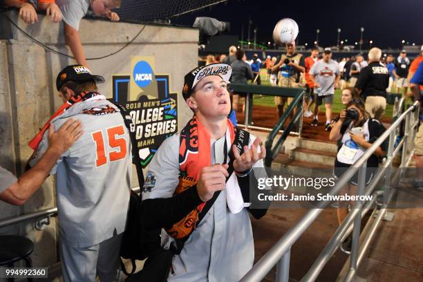 Kevin Abel of the Oregon State Beavers signs autographs after defeating the Arkansas Razorbacks during the Division I Men's Baseball Championship...