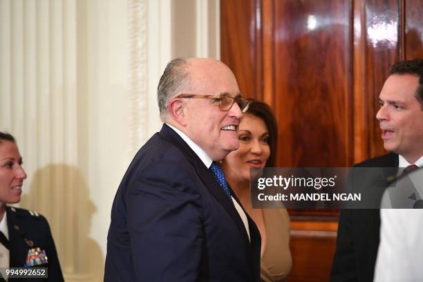 Attorney Rudy Giuliani and his wife Judith Giuliani attend the Supreme Court nomination in the East Room of the White House on July 9, 2018 in...