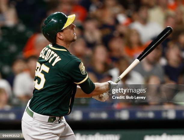 Stephen Piscotty of the Oakland Athletics hits a home run in the seventh inning against the Houston Astros at Minute Maid Park on July 9, 2018 in...