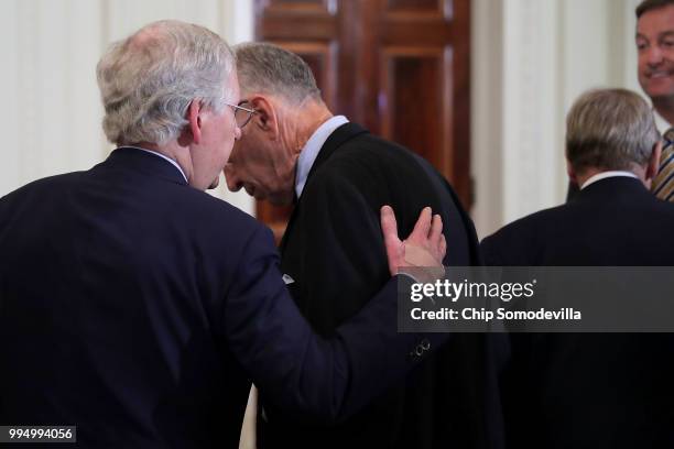 Senate Majority Leader Mitch McConnell and Senate Judiciary Committee Chairman Charles Grassley talk in the East Room before U.S. President Donald...