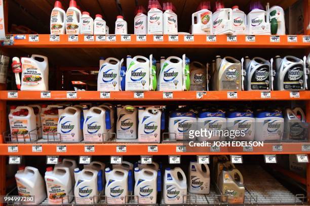 Roundup products are seen for sale at a store in San Rafael, California, on July 2018. A lawyer for a California groundskeeper dying of cancer took...