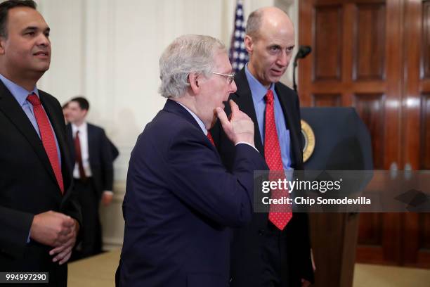 Senate Majority Leader Mitch McConnell leaves the East Room after U.S. President Donald Trump introduced Judge Brett Kavanaugh as his nominee to the...