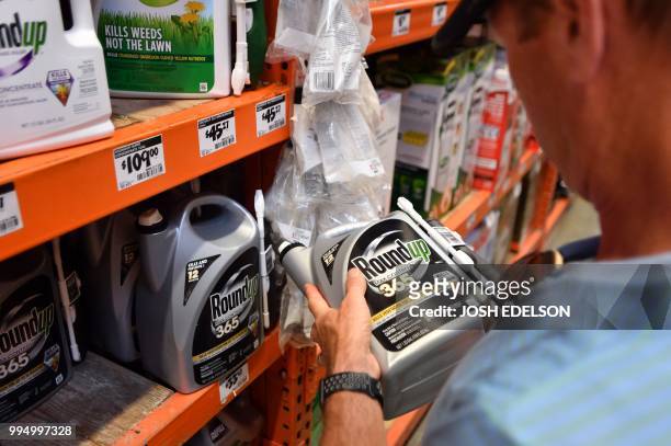 Customer Gary Harms shops for Roundup products at a store in San Rafael, California, on July 2018. A lawyer for a California groundskeeper dying of...