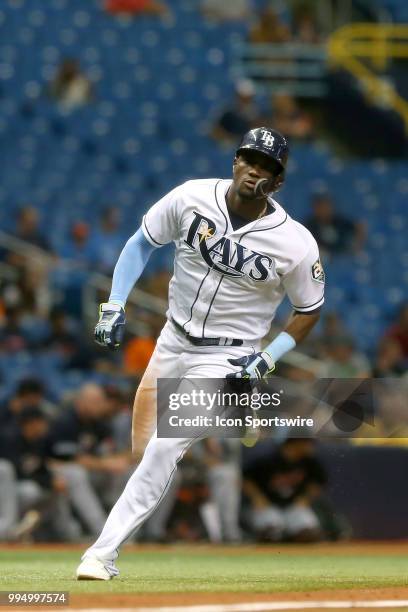 Adeiny Hechavarria of the Rays hustles home to score a run during the MLB regular season game between the Detroit Tigers and the Tampa Bay Rays on...