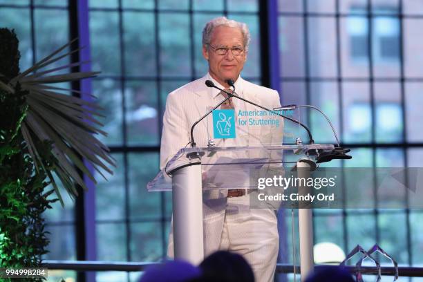 Tim Millhisir accepts the Advocacy Award presented to the Millhisir family in honor of Ross R. Millhisir during the American Institute for Stuttering...