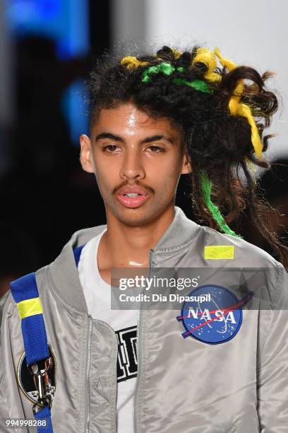 Model walks the runway at the Landlord fashion show during July 2018 New York City Men's Fashion Week at Cadillac House on July 9, 2018 in New York...