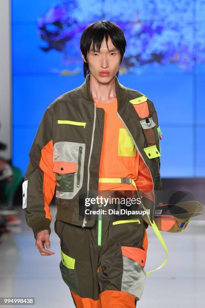 Model walks the runway at the Landlord fashion show during July 2018 New York City Men's Fashion Week at Cadillac House on July 9, 2018 in New York...