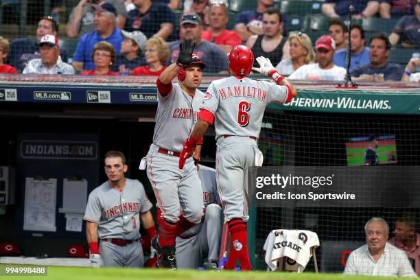 Cincinnati Reds first baseman Joey Votto congratulates Cincinnati Reds center fielder Billy Hamilton after Hamilton scored a run during the seventh...