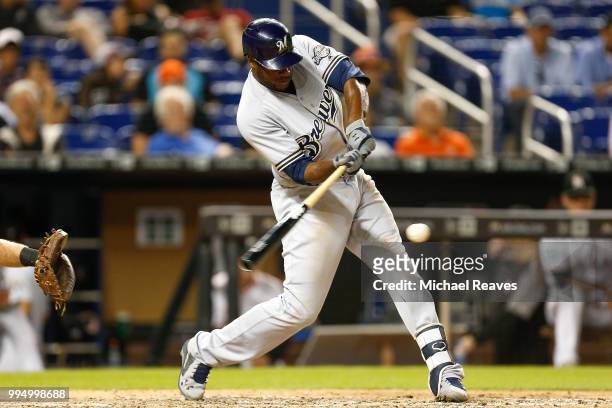 Lorenzo Cain of the Milwaukee Brewers singles against the Miami Marlins in the sixth inning at Marlins Park on July 9, 2018 in Miami, Florida.