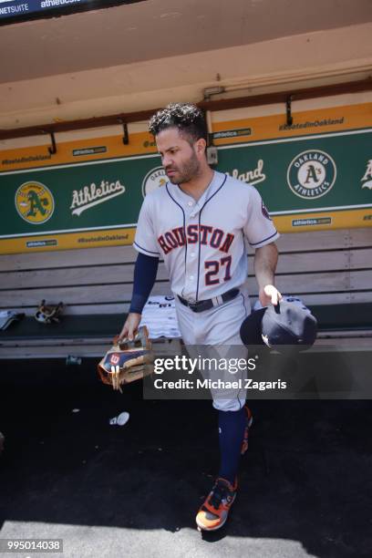 Jose Altuve of the Houston Astros stands in the dugout prior to the game against the Oakland Athletics at the Oakland Alameda Coliseum on June 14,...