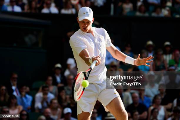 Kyle Edmund of Great Britain in action against Novak Djokovic of Serbia in the third round of the gentleman's singles at the All England Lawn Tennis...