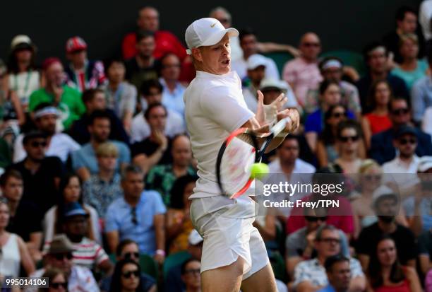 Kyle Edmund of Great Britain in action against Novak Djokovic of Serbia in the third round of the gentleman's singles at the All England Lawn Tennis...