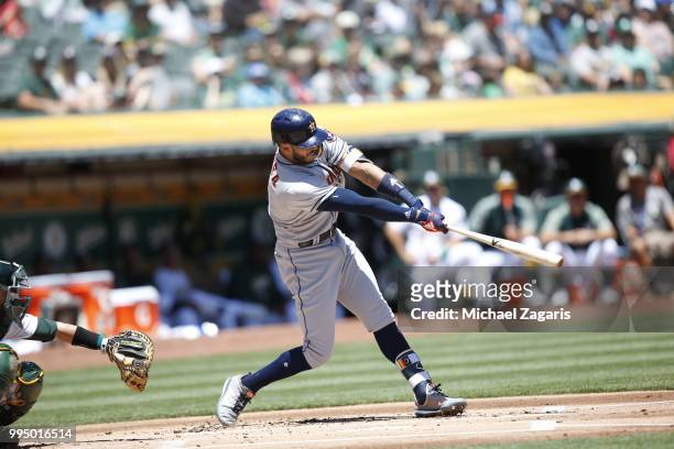 Carlos Correa of the Houston Astros bats during the game against the Oakland Athletics at the Oakland Alameda Coliseum on June 14, 2018 in Oakland,...