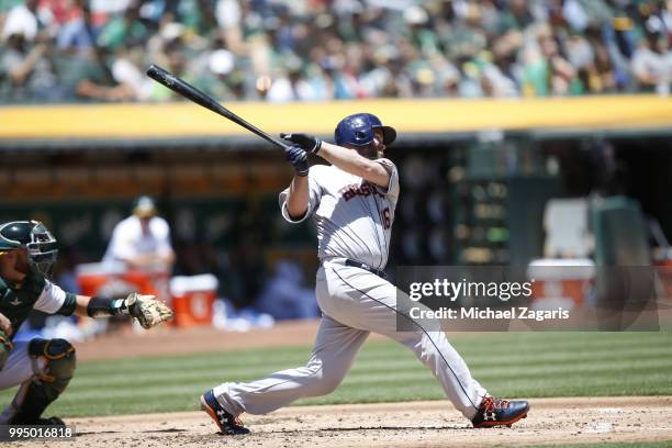 Brian McCann of the Houston Astros bats during the game against the Oakland Athletics at the Oakland Alameda Coliseum on June 14, 2018 in Oakland,...