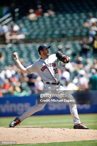 Justin Verlander of the Houston Astros pitches during the game against the Oakland Athletics at the Oakland Alameda Coliseum on June 14, 2018 in...