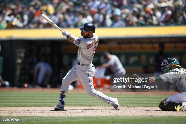 Marwin Gonzalez of the Houston Astros bats during the game against the Oakland Athletics at the Oakland Alameda Coliseum on June 14, 2018 in Oakland,...