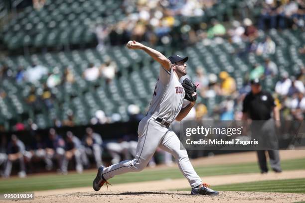 Justin Verlander of the Houston Astros pitches during the game against the Oakland Athletics at the Oakland Alameda Coliseum on June 14, 2018 in...