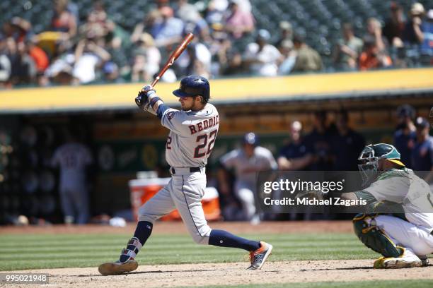 Josh Reddick of the Houston Astros bats during the game against the Oakland Athletics at the Oakland Alameda Coliseum on June 14, 2018 in Oakland,...