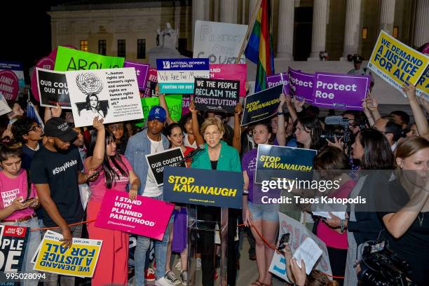 Senator Elizabeth Warren speaks to protesters in front of the U.S. Supreme Court on July 9, 2018 in Washington, DC. President Donald Trump is set to...