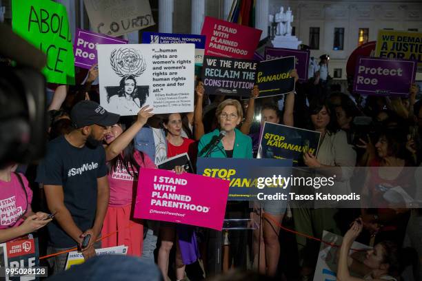 Senator Elizabeth Warren speaks to protesters in front of the U.S. Supreme Court on July 9, 2018 in Washington, DC. President Donald Trump is set to...